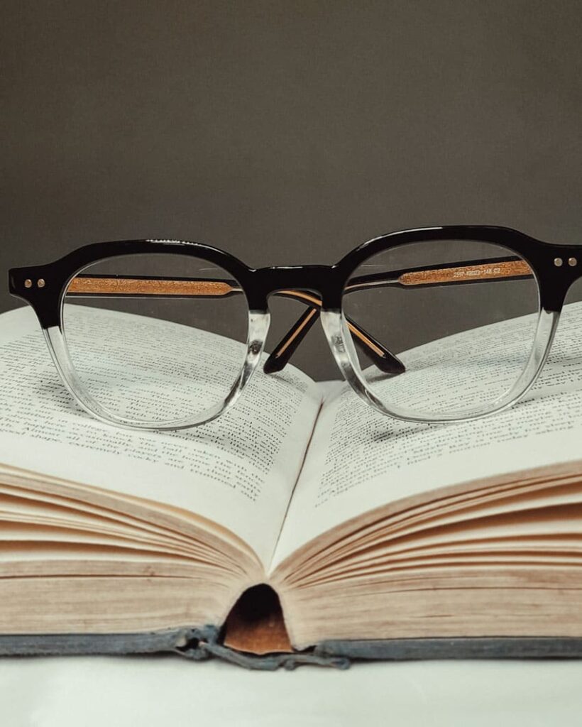 glasses over a book