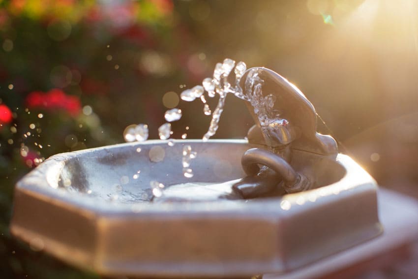 an-open-faucet-from-a-free-drinking-fountain