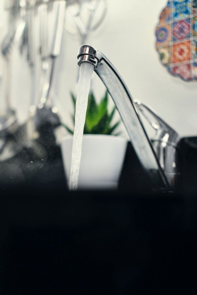 an-open-kitchen-faucet