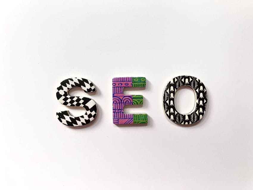 3D letters with tribal pattern forming the word SEO how to get your first sale on etsy