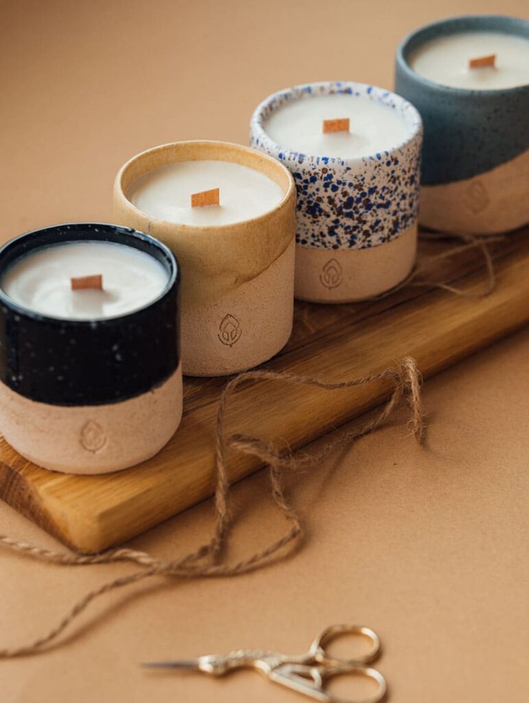 set of four candles with wick made out of wood
