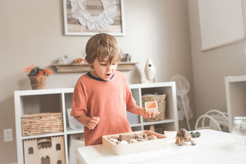 a kid founding an item in his house