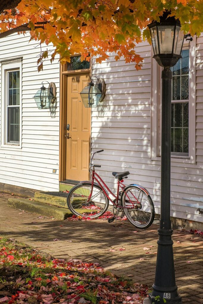 bike in the porch of a house. fall setting