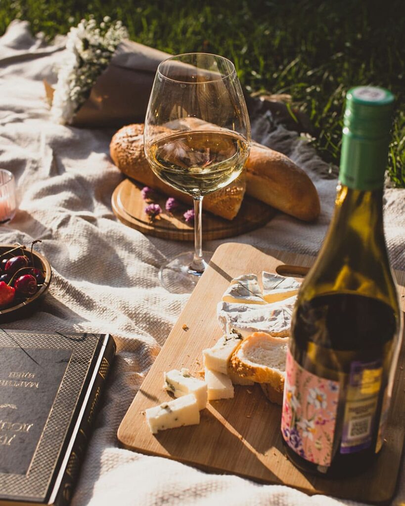 picnic with cup of white wine