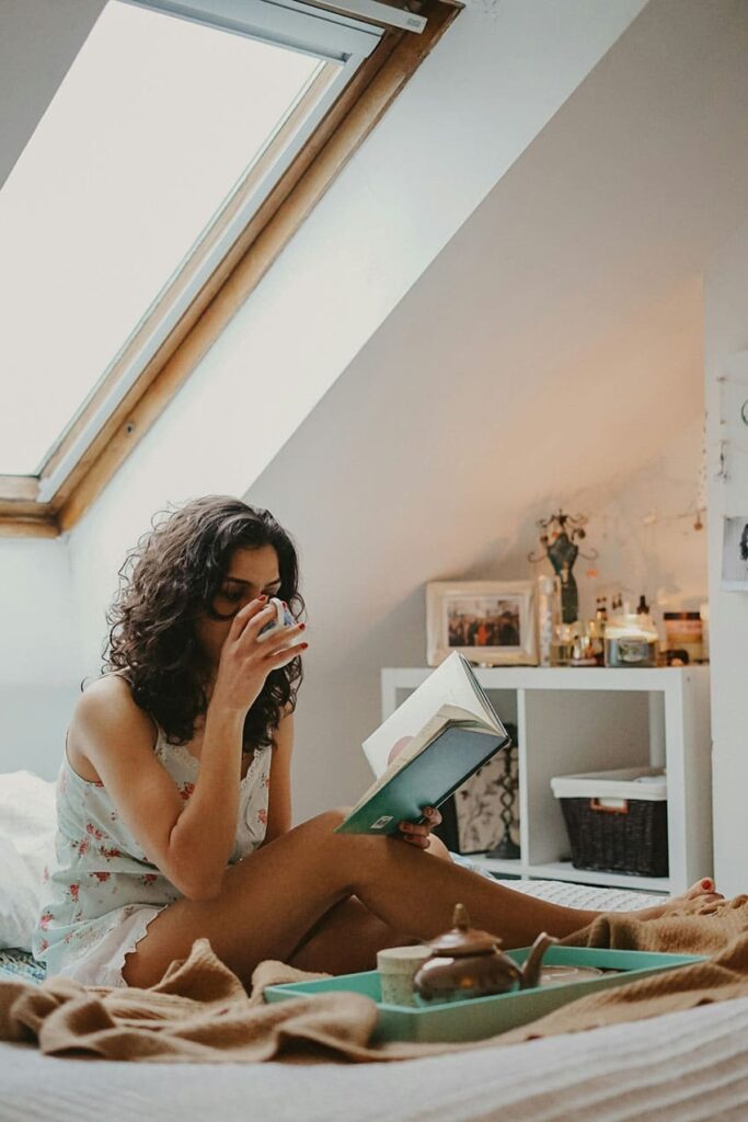 a woman reading enjoying selcare routine