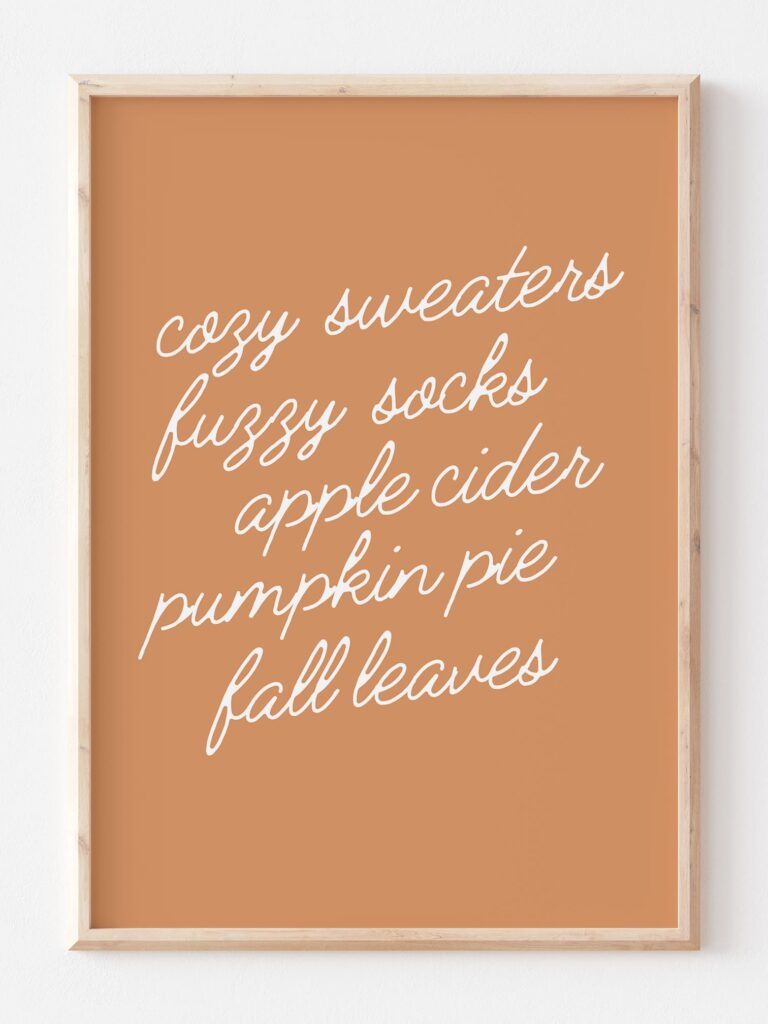 a melon color print featuring a white text saying cozy sweaters fuzzy socks apple cider pumpkin pie fall leaves