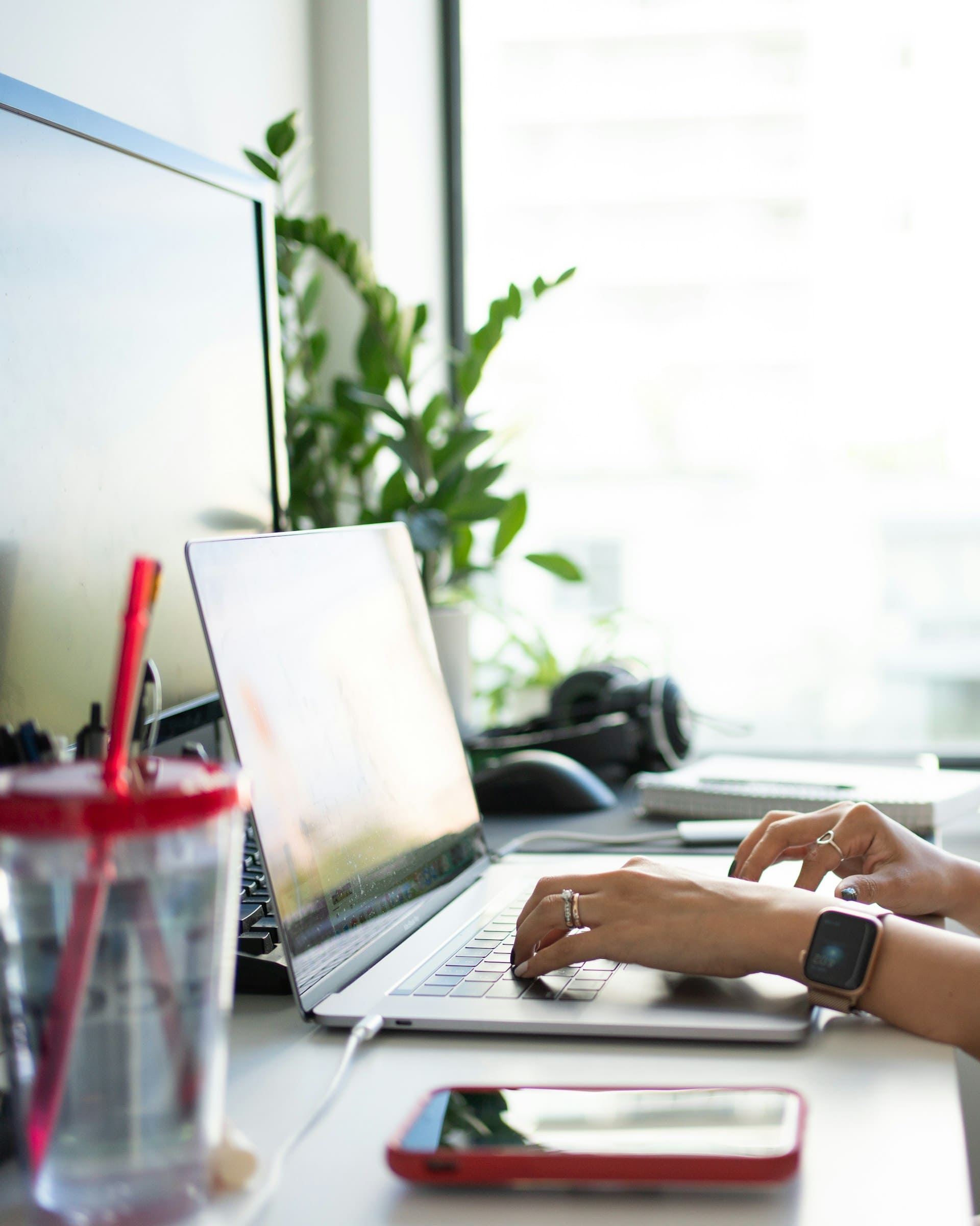 woman working with laptop at her home office